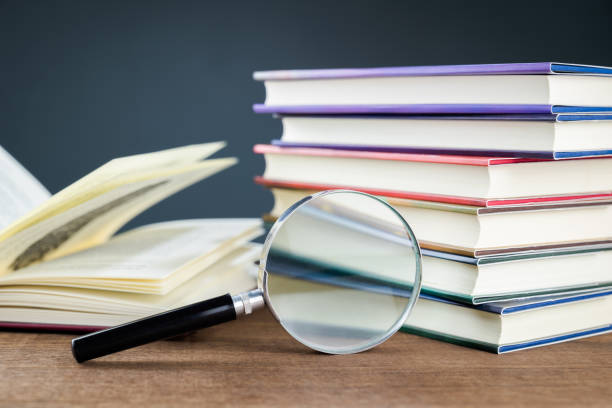istock Books, research,  and searching information concept 1411239897