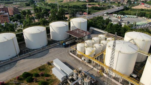 istock Industrial development, factory raw material reserve tower 1411240457