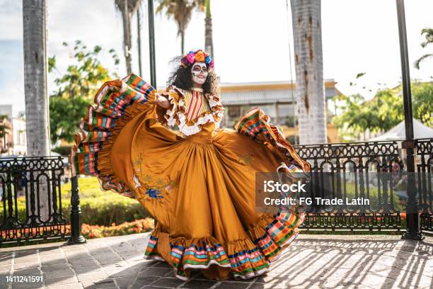 Mid Adult Woman Dancing And Celebrating The Day Of The Dead Stock Photo - Download Image Now