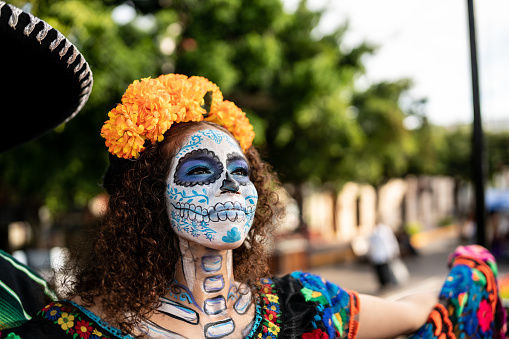 Young woman celebrating the day of the dead