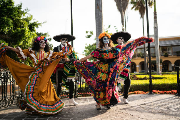 Couples dancing and celebrating the day of the dead stock photo