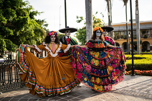 Couples dancing and celebrating the day of the dead