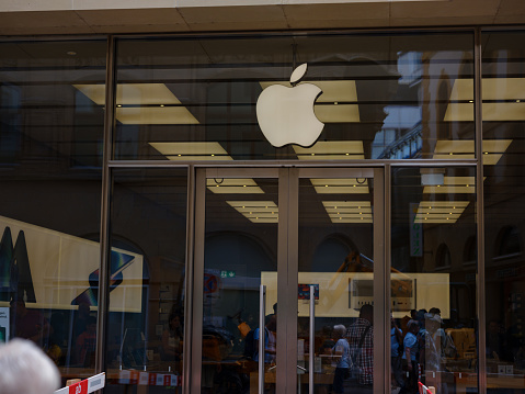 Basel, Switzerland - July 4 2022: Apple Store logo at the entrance to the Apple Store on BAsel.