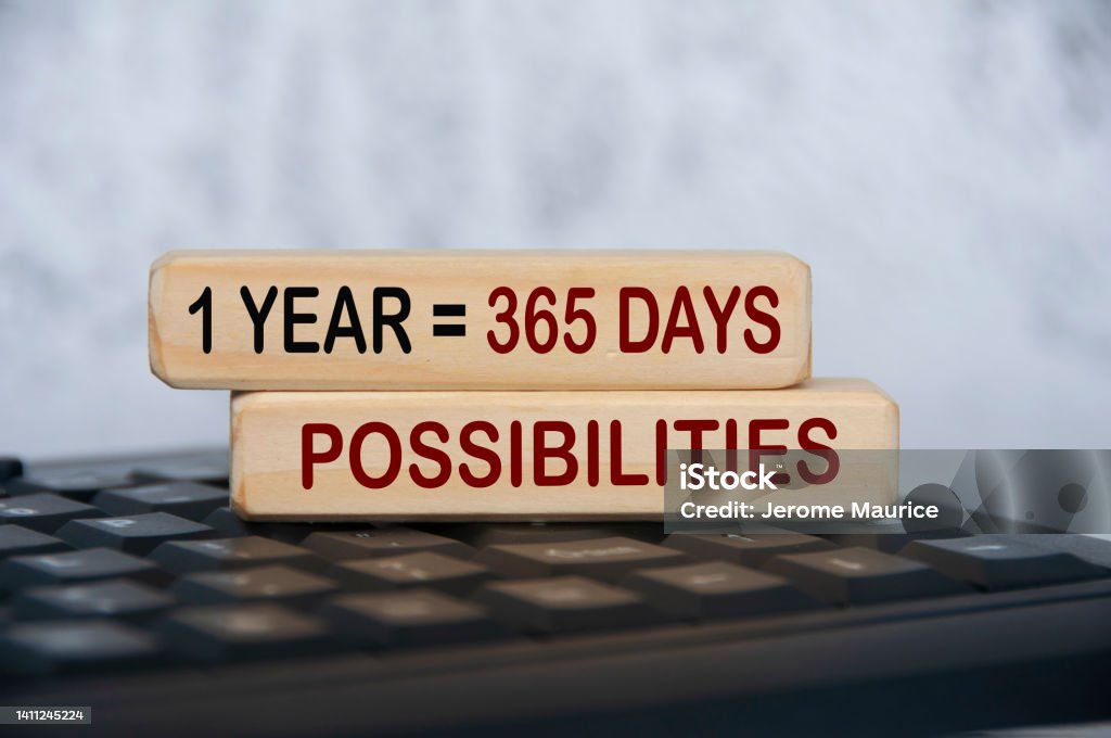365 possibilities text on wooden blocks on top of keyboard. Motivational concept. 365 possibilities text on wooden blocks on top of keyboard. Lifestyle and motivational concept. Office Stock Photo