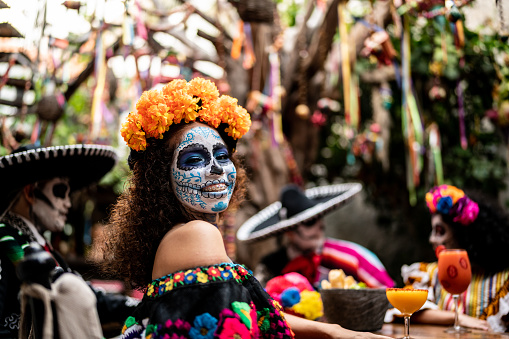 Portrait of a young woman celebrating the day of the dead