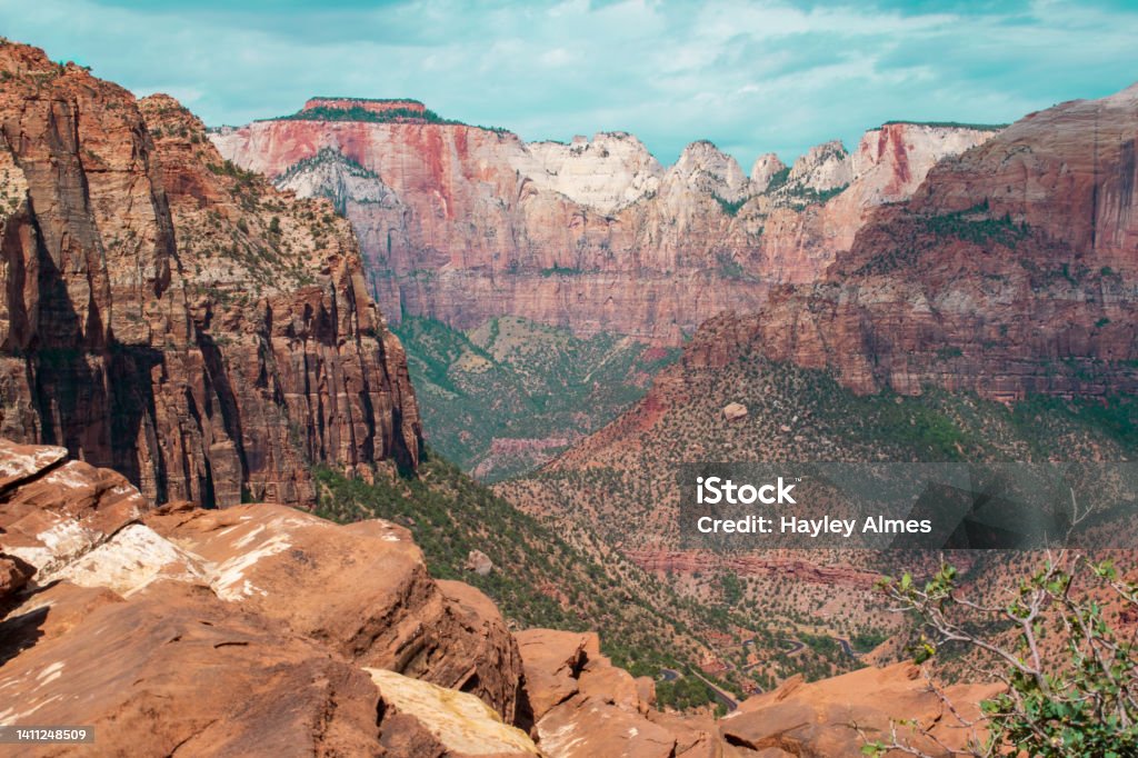 Zion Canyon Overlook in Bryce Canyon Via Canyon overlook trail, overlooks Zion Canyon with road to the park in the valley. Landscape - Scenery Stock Photo