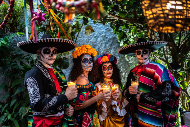 Portrait of a friends celebrating the day of the dead lighting candle Portrait of a friends celebrating the day of the dead lighting candle day of the dead photos stock pictures, royalty-free photos & images