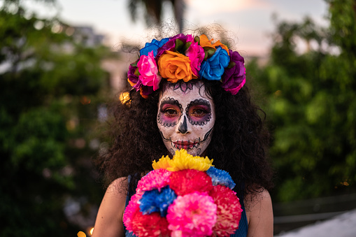 Portrait of a mid adult woman celebrating the day of the dead
