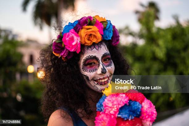 Portrait Of A Mid Adult Woman Celebrating The Day Of The Dead Outdoors Stock Photo - Download Image Now
