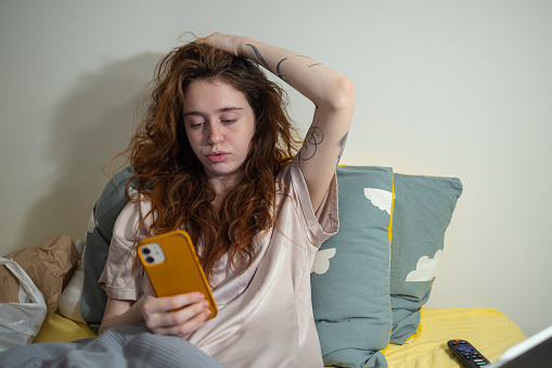 Wasting time on smartphone. Millennial generation mental health.