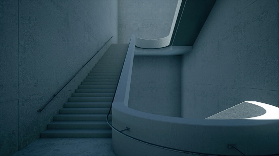 A modern white staircase in apartment house in a shadow. Modern staircase design. Scary stairs. Anxiety