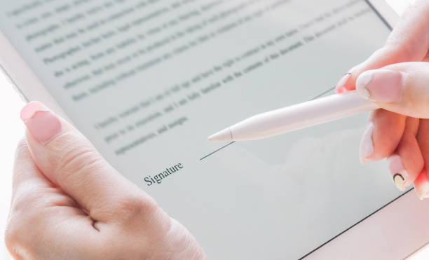 istock Electronic Signature - Making a Signature on the screen 1411256388