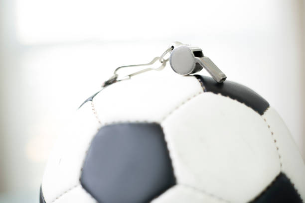istock Soccer Ball closeup with whistle on top 1411256625