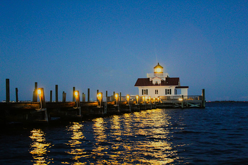 A night sky with the incredible Roanoke Marshes Lighthouse located in Manteo, NC