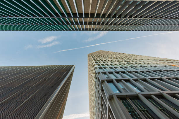 istock Looking up at skyscrapers in Frankfurt's banking district 1411258644