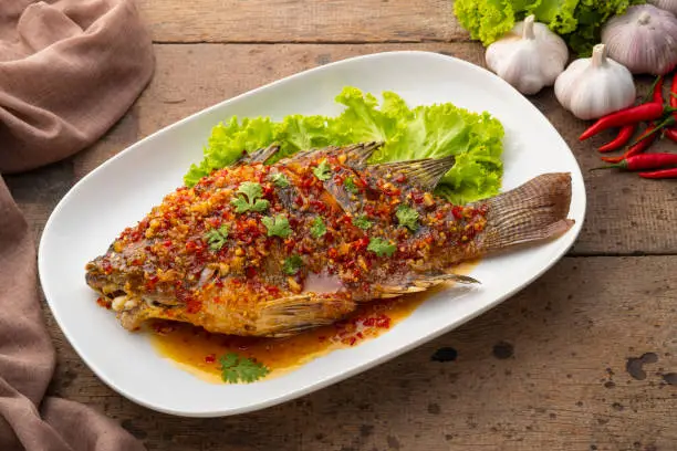 Deep fried Tilapia fish with Hot Sweet and Sour Sauce (Pla Rad Prik)