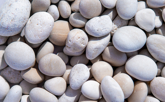 Close-up on white pebbles. High angle view.
