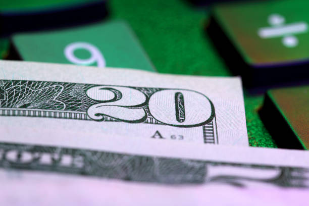 istock Money and calculator 1411259052