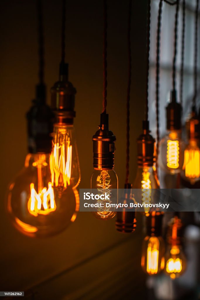 Row of edison lamps of different shapes Row of edison lamps of different shapes. Tungsten - Metal Stock Photo