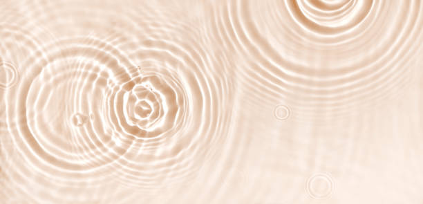 istock water texture ripples wave clean transparent water abstract background in beige color 1411265518