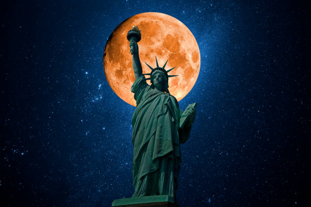 istock Statue of liberty with universe background 1411267201