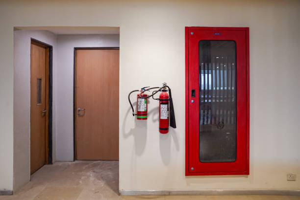 istock Fire extinguisher and gas pump system on the wall. Powerful emergency fire extinguisher equipment. Fire retardant. Fireproof. 1411267993