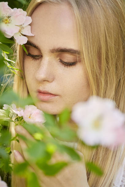 istock girl with flowers 1411269513