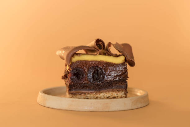 istock Slice Of Fruit Chocolate Cake On Plate 1411275510