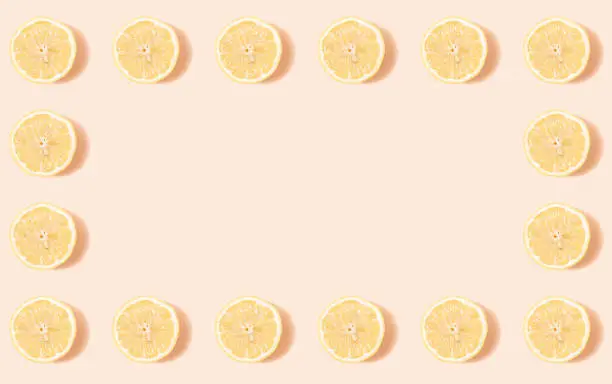 Creative summer frame made of lemon slices - minimal concept for advertising design