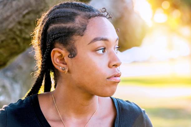 istock Serious afro-latinx young woman looking away 1411278264