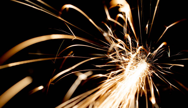 istock sparks in the dark. lines of light. 1411282398