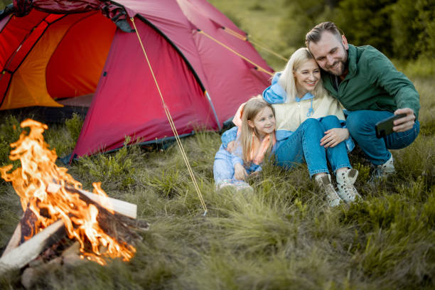 istock Family spend summer time at campsite while travel 1411282461
