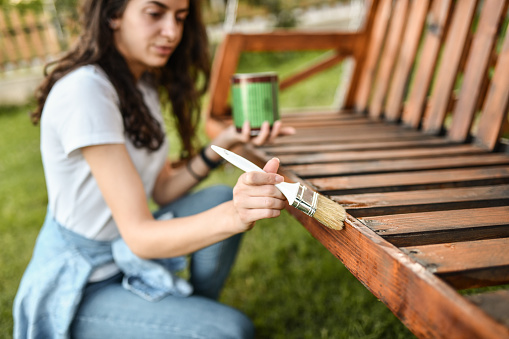 Accurate Paintbrush Work Done By Female Painting Bench