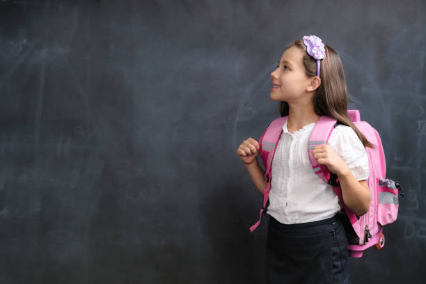 istock Back To School Concept, Happy Smiling Child Student Studying 1411287169