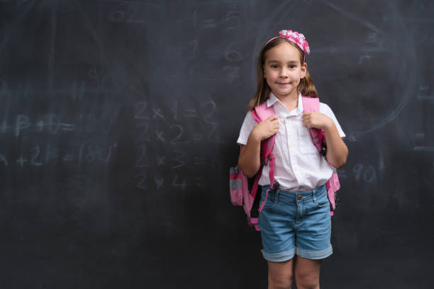 istock Back To School Concept, Happy Smiling Child Student Studying 1411288082