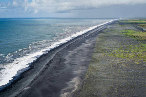 istock black beach and the sea 1411288266