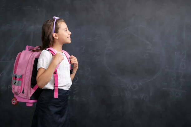 istock Back To School Concept, Happy Smiling Child Student Studying 1411288710