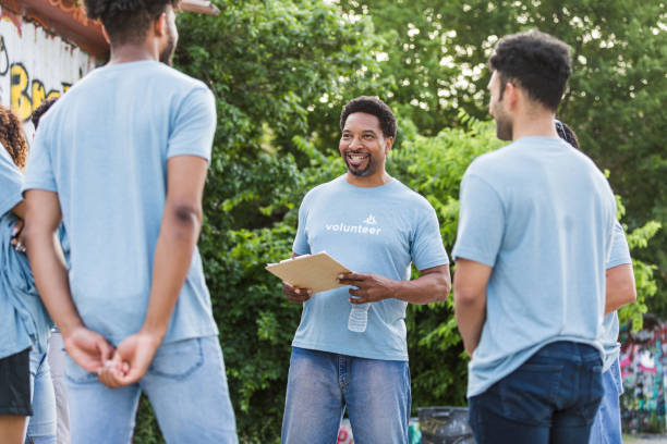 istock Friends stand in a circle 1411288747