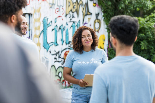 istock Coworkers meet at the graffiti wall 1411288761