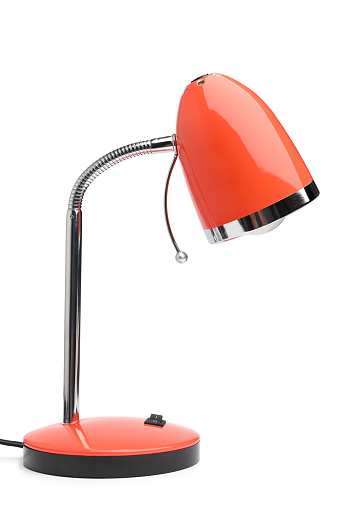 Orange desk lamp on white background