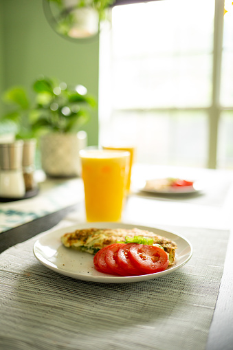 Dining Room with Spinach and Onion Omelette with Tomatoes
Shallow DOF