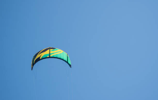 istock Kitesurf kite against clear sky 1411293651
