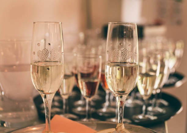 istock Two glasses of champagne 1411299717
