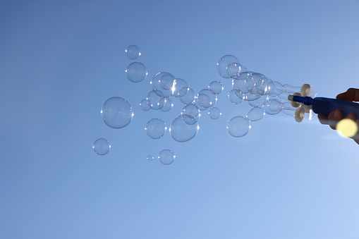 Soap Bubbles on blue background