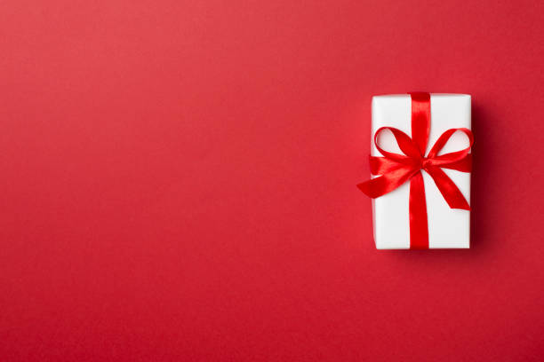 istock Top view of gift box on color background 1411301595