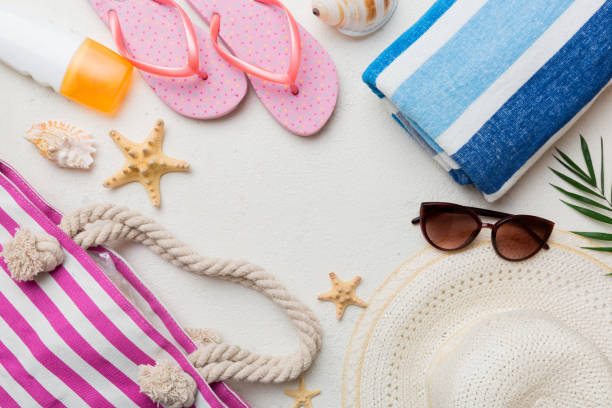 istock Summer vacation concept flat lay. beach accessories and towel top view. Space for text. travel concept 1411301835