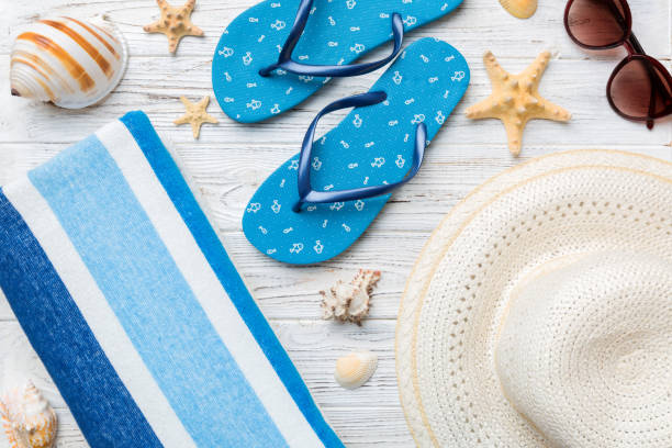 istock Summer vacation concept flat lay. beach accessories and towel top view. Space for text. travel concept 1411301854