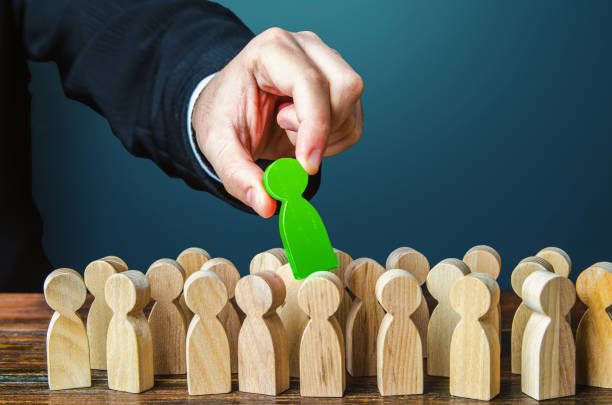 istock Select best candidate for work. Labor market. Specialists and professional workers. Targeting and marketing. Talent search. Education and training, good skills and performance. Make a leader 1411306265