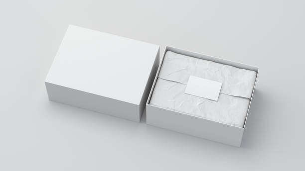istock Gift box mock up with cover. White gift box with blank label or business card on wrapping paper. White background. Side view. 1411307570
