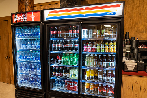 Montana, USA - July 4, 2022:  Cooler full of pop, soda, and bottled water at the Many Glacier Hotel in Glacier National Park